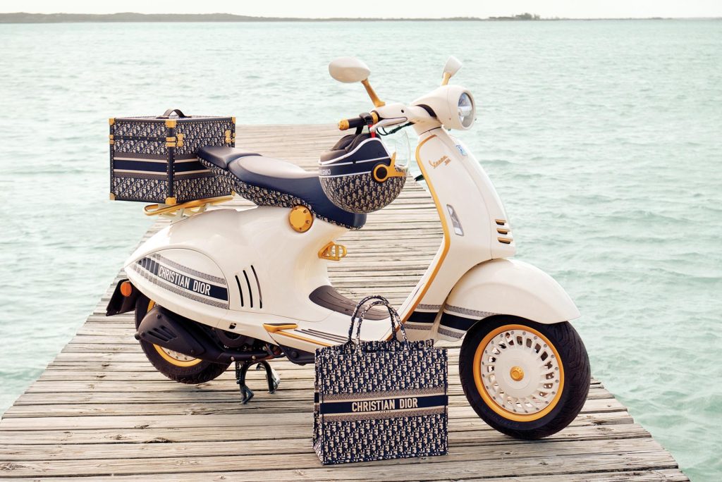 Dior Joins Forces With Vespa To Create An Exclusive Scooter And A Range Of Matching Accessories, Celebrating The Sunny-Spirit And Art Of Living Of The Two Houses.
